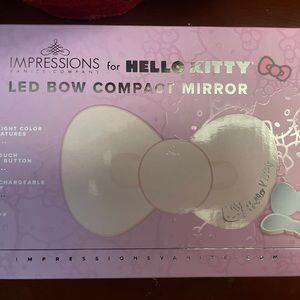 NEW Impressions HELLO KITTY Mini LED Bow Compact Mirror - Rechargeable, Auto Off